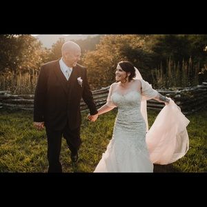 Custom made wedding dress. Worn once size 12